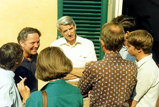 Cortona Week participants gathered in conversation outdoors.